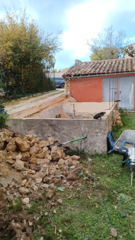 Construction d’un mur de soutènement pour sécurisation et aménagement du terrain -  - Juganu Rénovation
